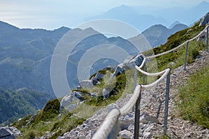 Stony road with rope fence on the peak Sv. Jure in Biokovo national park