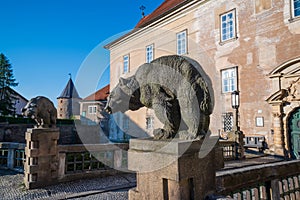 Stony sculptures of bears near entrance to Castle of Nove Mesto nad Metuji, Czech Republic