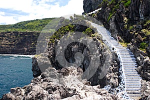 Stony stairs on rocky cliff