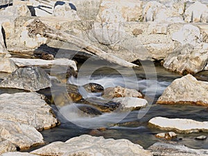 Stony stream in the forest long exposure