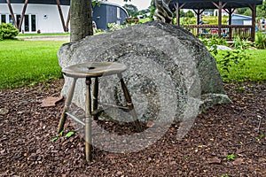The stool and the oak represent Jean-Julien Bourgault, Saint-Jean Port Joli