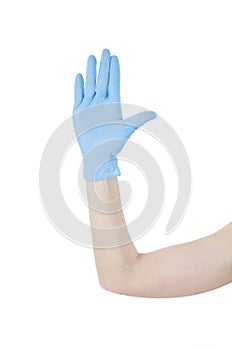 Stop with a blue medical glove. Protection concept. 2019-nCov.
