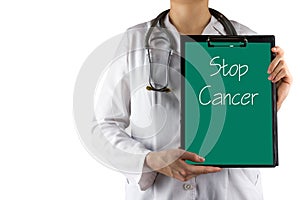 Stop Cancer - Female doctor's hand holding medical clipboard and stethoscope. Concept of Healthcare And Medicine. Copy