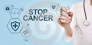 Stop cancer medical healthcare concept on virtual screen.
