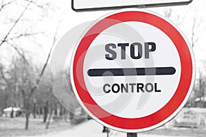 Stop control sign in front. Red stop road sign. Stop sign for traffic
