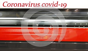 Stop coronavirus. Motion blur of high speed train in station.Train and passengers - red background. Travel Alert Concept. Health