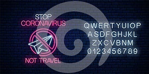 Stop coronavirus neon sign with not travel symbol with alphabet. COVID-19 virus caution symbol in neon style