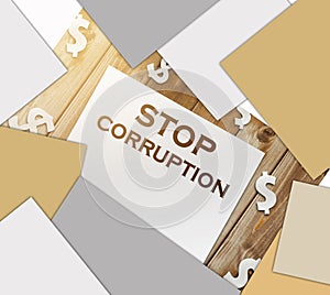 Stop Corruption Words on page and paper dollar signs around on wooden table. Anticorruption business concept photo