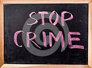 Stop crime word on blackboard