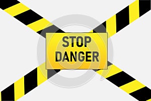 Stop danger. Warning sign, danger zone warning. Yellow and black tapes indicate danger.