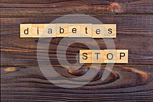 stop diabetes text word made with wood blocks. Concept Diabetes Prevention