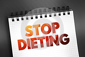 Stop Dieting text on notepad, concept background