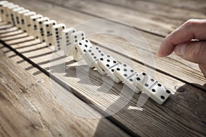 Stop the domino effect concept for business solution and intervention