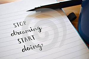STOP DREAMING START DOING hand-lettered in notebook