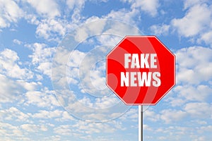 Stop fake news road sign