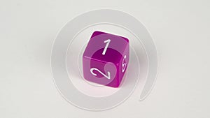 Stop frame animation of a purple D6 gaming die used for table top role playing games