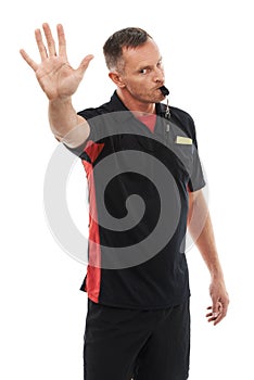 Stop, hand and portrait of man referee blowing whistle for studio warning, penalty or gesture on white background