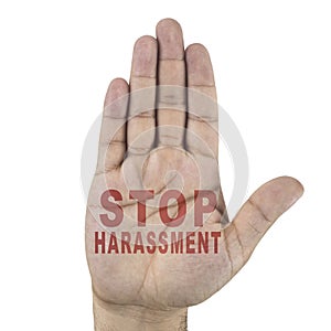 Stop harassment words written on male`s hand. on white background photo