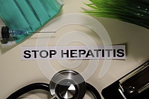 Stop Hepatitis with inspiration and healthcare/medical concept on desk background