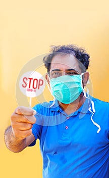 Stop the infection! Healthy man showing gesture