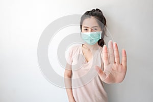 Stop the infection! Healthy woman showing gesture