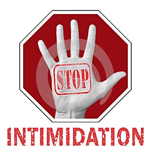 Stop intimidation conceptual illustration. Open hand with the text stop intimidation photo