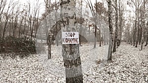 Stop kidnapping - Banner on the tree - Snow - Winter day