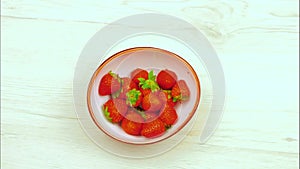 Stop Motion Animation of a Disappearing Bowl of Strawberries