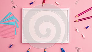 Stop motion animation mockup of pen, sticky note, notepad, marker, eraser, push pins, paper clip pencils on pink background. Flat