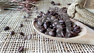 Stop Motion of Coffee Bean Dropping on Wooden Spoon,