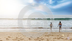 Stop motion happy two children wear swimwear running from beach to the sea. Happy family holiday summer concept. Two girl running