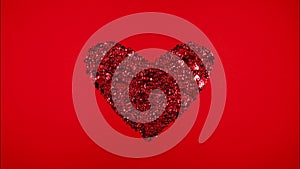 Stop motion of heartbeat, red heart on red background. Footage video. Closeup heartbeat. Motion of glitter. Love.