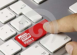 Stop Piracy - Inscription on Red Keyboard Key