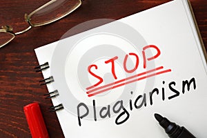 Stop plagiarism sign written.