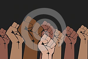 Stop racism. Many multi colored fist protesting on dark background. Black lives matter. Different races hands protest, interracial