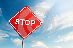 Stop road sign with blue sky and cloud background
