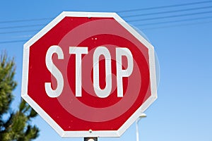 Stop road sign close up