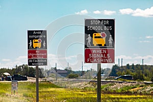 Stop for school bus road warning sign