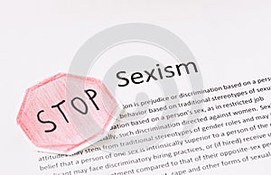 Stop sexism phrase. prejudice or discrimination based on a person's gender photo