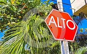 Stop sign Alto in Spanish in Puerto Escondido Mexico photo