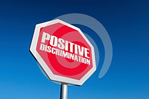 Stop sign as a symbol of overusing the positive discrimination in society as an issue of anti-racism fight