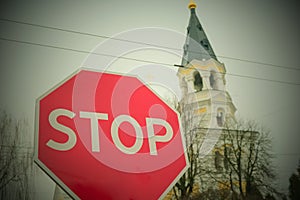 Stop sign with a beautiful background. Peaceful rural area view