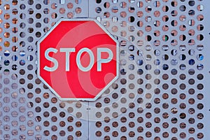 Stop sign at a closed construction site due to an epidemic of coronavirus disease