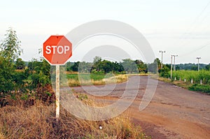 Stop sign in country road