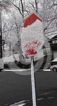 Stop Sign Covered with Fresh Snow