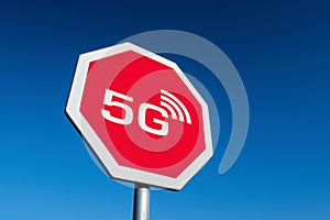 Stop sign dealing with radiation from 5G radio waves which are believed to be harmful by conspiracy theories claiming it causes