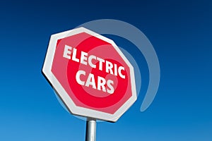 Stop sign with ELECTRIC CARS text to abandon controversial EVs as a future transportation photo