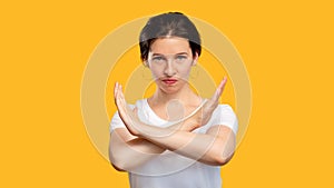 Stop sign forbidden gesture angry woman hands photo