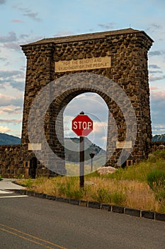 Stop Sign Framed In Roosevelt Arch In Gardiner