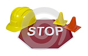 Stop Sign with Hard Hat and Safety Cones